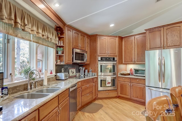 274 Slippery Rock Rd, Waynesville, NC 28785 - kitchen featuring appliances with stainless steel finishes, a sink, light stone countertops, healthy amount of natural light, and recessed lighting