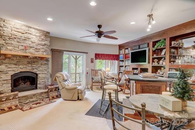274 Slippery Rock Rd, Waynesville, NC 28785 - living room featuring a ceiling fan, a stone fireplace, recessed lighting, and light colored carpet