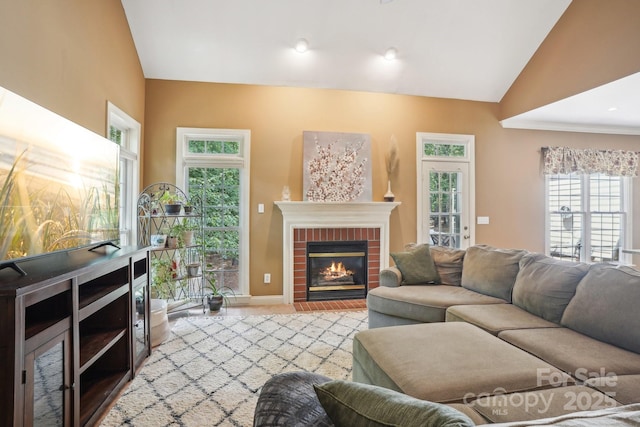 134 Lake Spring Loop, Mooresville, NC 28117 - living room with lofted ceiling, a fireplace, wood finished floors, and baseboards
