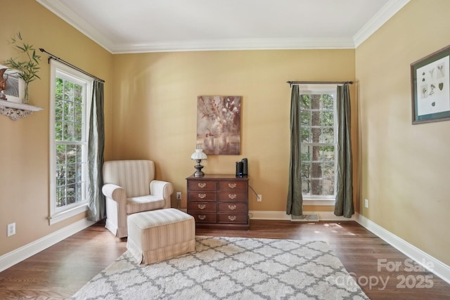 134 Lake Spring Loop, Mooresville, NC 28117 - sitting room with healthy amount of natural light, wood finished floors, ornamental molding, and baseboards