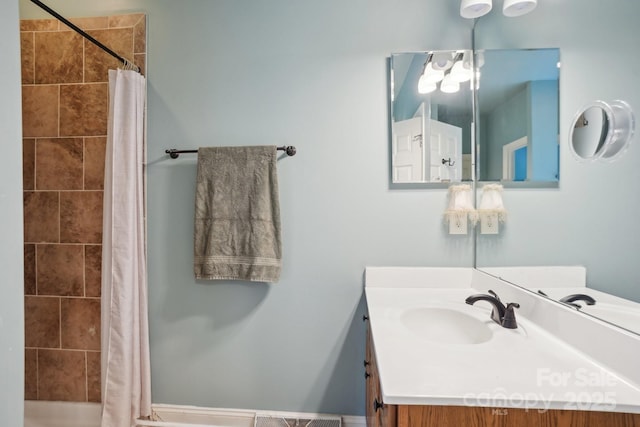 134 Lake Spring Loop, Mooresville, NC 28117 - bathroom with vanity, tiled shower, and a chandelier
