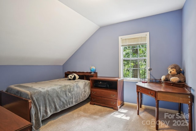 134 Lake Spring Loop, Mooresville, NC 28117 - bedroom featuring vaulted ceiling and light colored carpet