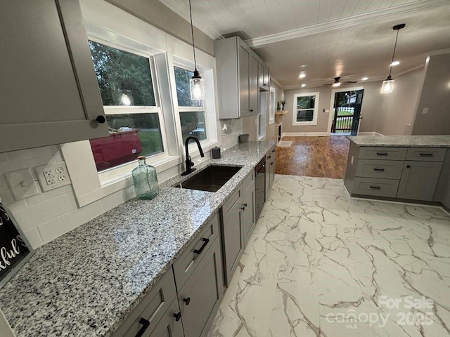 410 Gann St, Lowell, NC 28098 - kitchen featuring a sink, gray cabinetry, crown molding, a ceiling fan, and open floor plan