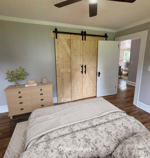 410 Gann St, Lowell, NC 28098 - bedroom with wood finished floors, a barn door, ornamental molding, and a ceiling fan