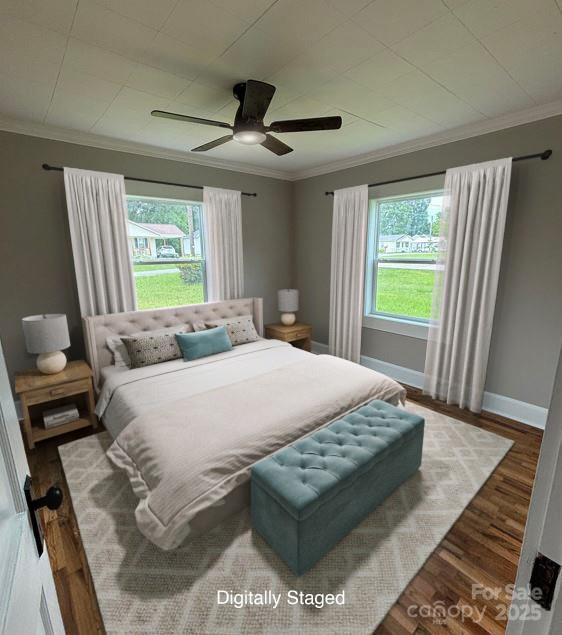 410 Gann St, Lowell, NC 28098 - bedroom featuring ornamental molding, wood finished floors, and a ceiling fan