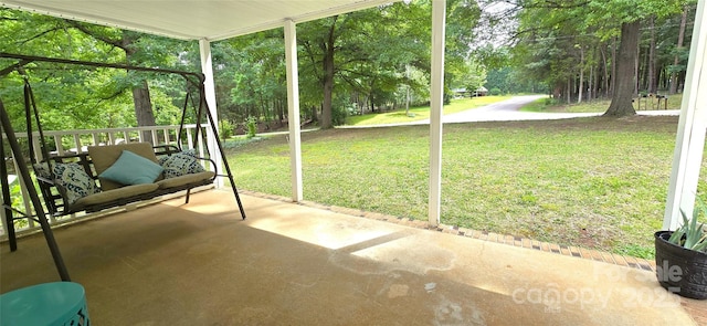 6140 Barclay Ln, Clover, SC 29710 - unfurnished sunroom featuring view of wooded area