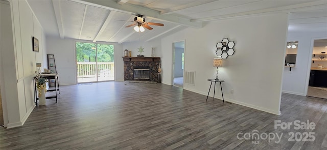 6140 Barclay Ln, Clover, SC 29710 - unfurnished living room with a ceiling fan, dark wood-style floors, a stone fireplace, and baseboards