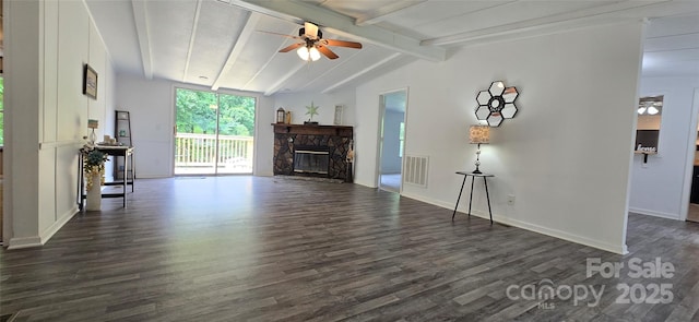 6140 Barclay Ln, Clover, SC 29710 - unfurnished living room featuring a ceiling fan, dark wood-style flooring, a stone fireplace, and baseboards