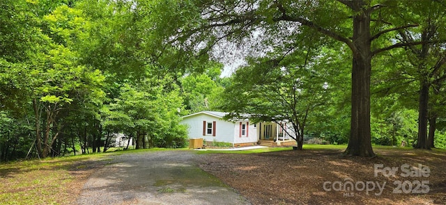 6140 Barclay Ln, Clover, SC 29710 - view of front facade with crawl space and asphalt driveway