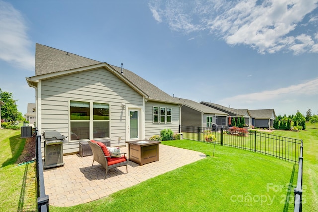 4511 Middlebury Ln, Fort Mill, SC 29715 - back of house featuring a patio area, a shingled roof, and central AC unit