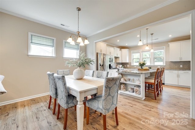 4511 Middlebury Ln, Fort Mill, SC 29715 - dining room featuring a chandelier, ornamental molding, light wood finished floors, baseboards, and recessed lighting