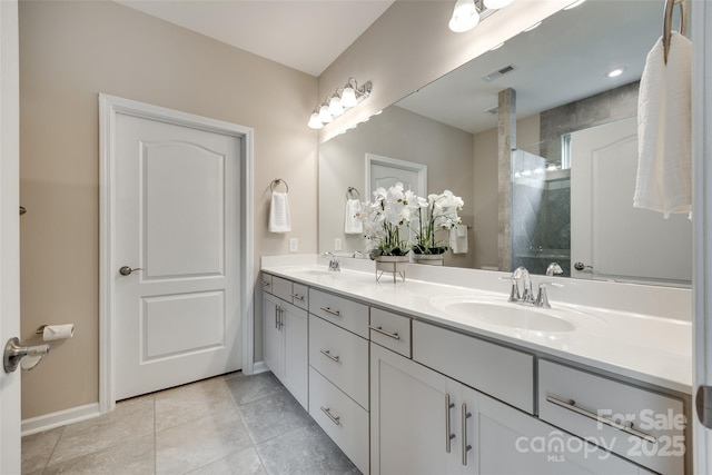 4511 Middlebury Ln, Fort Mill, SC 29715 - full bath with double vanity, baseboards, tile patterned floors, and a shower
