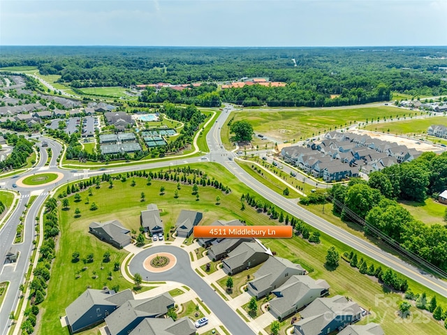 4511 Middlebury Ln, Fort Mill, SC 29715 - aerial perspective of suburban area featuring a heavily wooded area