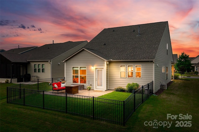 4511 Middlebury Ln, Fort Mill, SC 29715 - back of house at dusk featuring a patio area and roof with shingles