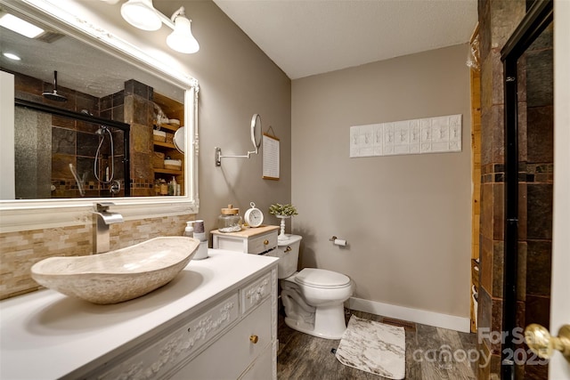 354 Ivy Ridge Cir, Sylva, NC 29779 - bathroom featuring a shower stall, vanity, toilet, and wood finished floors