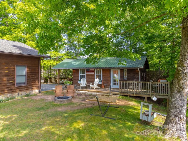 354 Ivy Ridge Cir, Sylva, NC 29779 - rear view of property with a fire pit and a yard