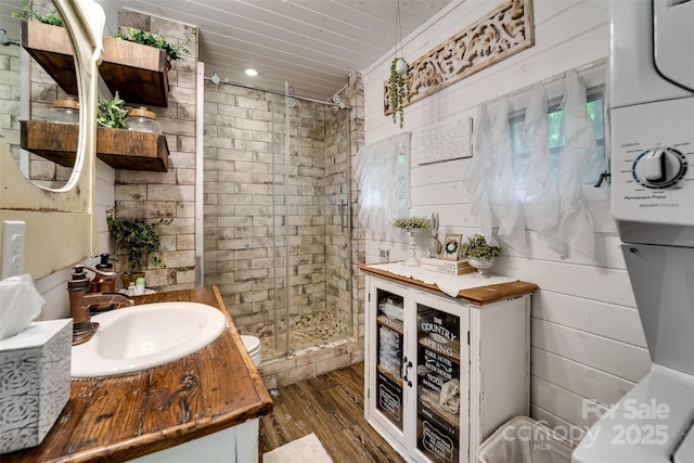 354 Ivy Ridge Cir, Sylva, NC 29779 - full bath featuring a shower stall, vanity, wood finished floors, wood ceiling, and toilet