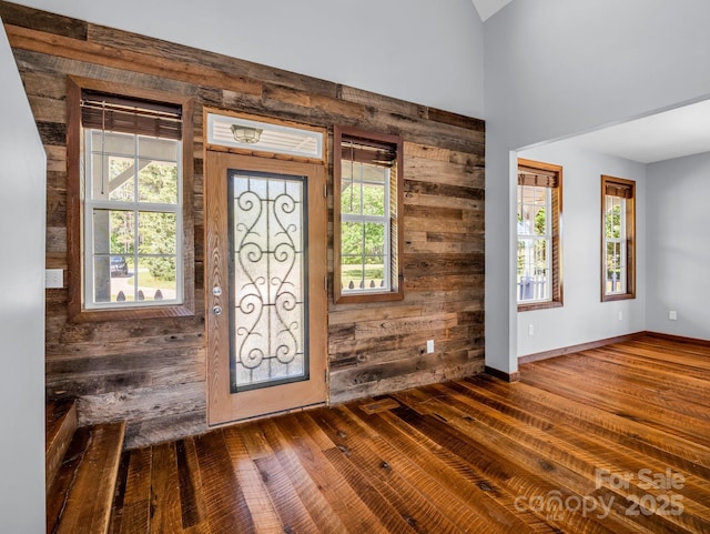 4830 Chesnee Rd, Rutherfordton, NC 28139 - foyer entrance with wooden walls and dark wood finished floors