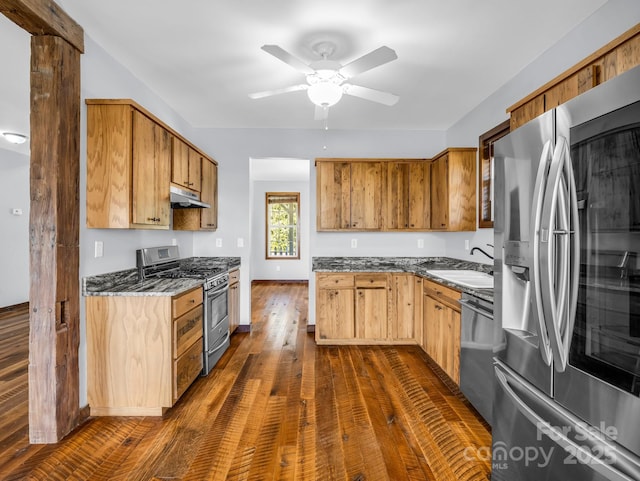 4830 Chesnee Rd, Rutherfordton, NC 28139 - kitchen featuring appliances with stainless steel finishes, under cabinet range hood, a sink, dark wood-style flooring, and ceiling fan