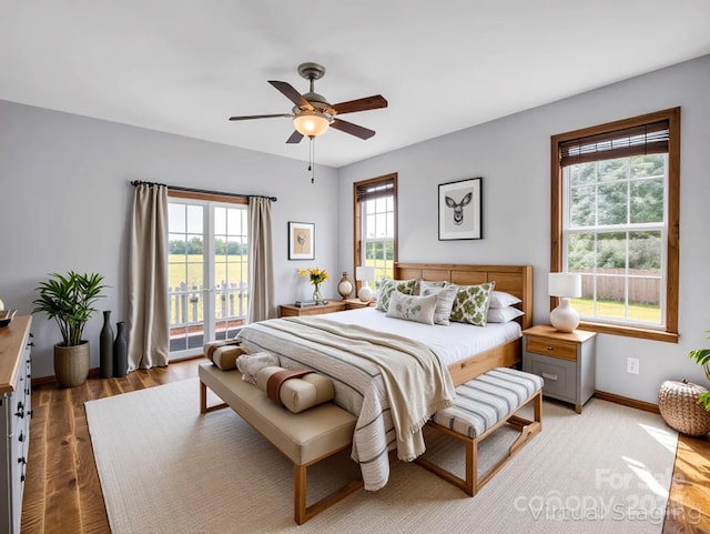 4830 Chesnee Rd, Rutherfordton, NC 28139 - bedroom with wood finished floors, baseboards, and ceiling fan