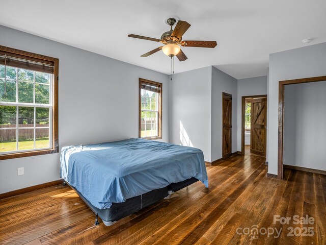 4830 Chesnee Rd, Rutherfordton, NC 28139 - bedroom featuring wood finished floors, baseboards, and a ceiling fan