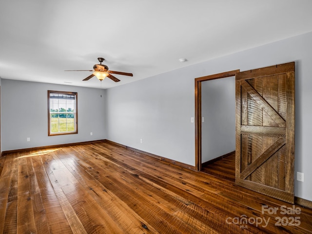 4830 Chesnee Rd, Rutherfordton, NC 28139 - empty room with a ceiling fan, hardwood / wood-style flooring, baseboards, and a smoke detector