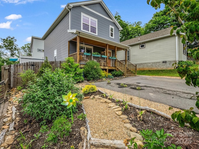 725 Center St, Asheville, NC 28803 - view of front of property featuring a porch, crawl space, and board and batten siding