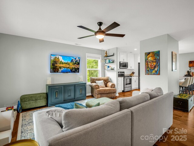 725 Center St, Asheville, NC 28803 - living room with a ceiling fan and wood finished floors