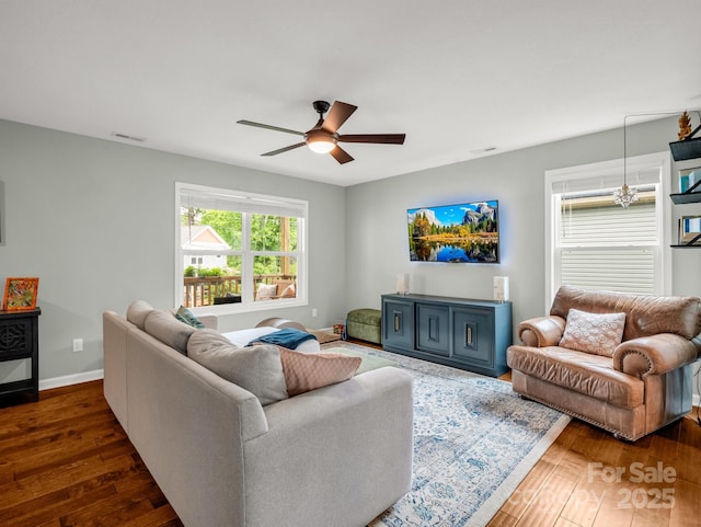 725 Center St, Asheville, NC 28803 - living area with wood-type flooring, ceiling fan, and baseboards