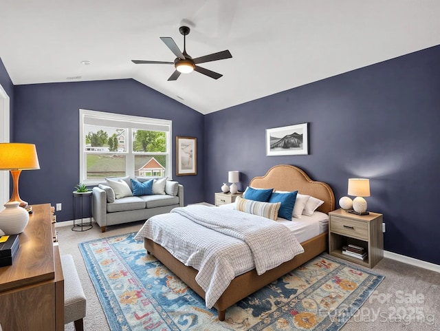 725 Center St, Asheville, NC 28803 - carpeted bedroom with lofted ceiling, baseboards, and a ceiling fan