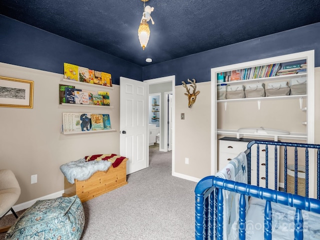 725 Center St, Asheville, NC 28803 - bedroom featuring carpet floors, baseboards, and a closet