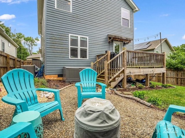 725 Center St, Asheville, NC 28803 - rear view of house with a wooden deck and central AC