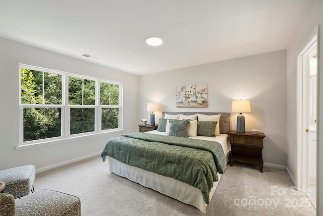 126 Meadow Glen Dr, Troutman, NC 28166 - carpeted bedroom featuring baseboards
