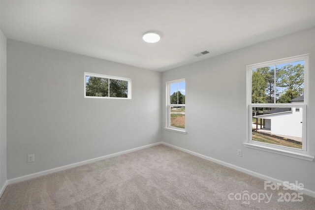 126 Meadow Glen Dr, Troutman, NC 28166 - empty room with carpet flooring and baseboards