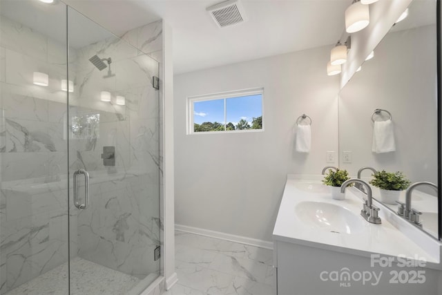 126 Meadow Glen Dr, Troutman, NC 28166 - full bath with double vanity, a marble finish shower, marble finish floors, and baseboards