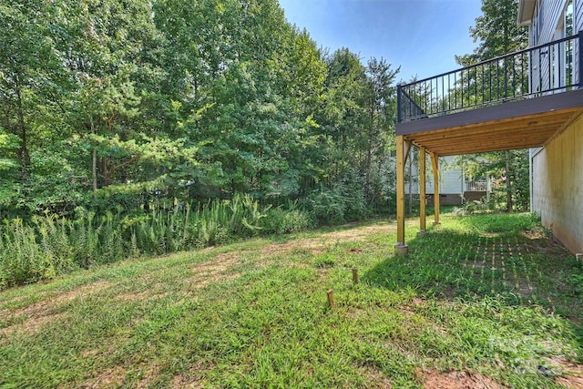 126 Meadow Glen Dr, Troutman, NC 28166 - view of green lawn featuring a deck