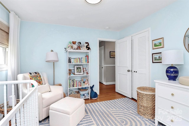 5929 Brookhaven Rd, Charlotte, NC 28210 - bedroom featuring wood finished floors and a closet