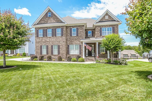 424 Cassia Ct, Fort Mill, SC 29708 - view of front of home with a front yard and brick siding
