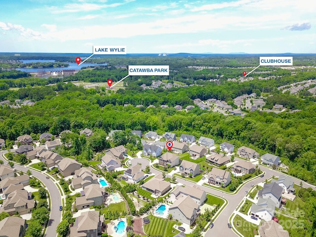 424 Cassia Ct, Fort Mill, SC 29708 - aerial view of residential area with a forest and a nearby body of water