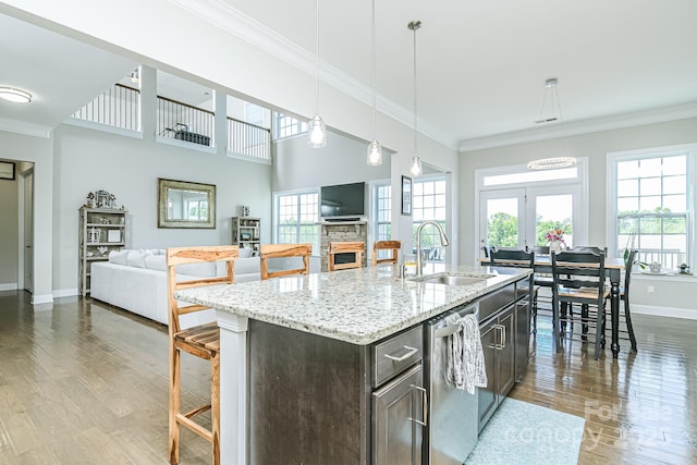 424 Cassia Ct, Fort Mill, SC 29708 - kitchen with a sink, stainless steel dishwasher, ornamental molding, baseboards, and dark wood finished floors