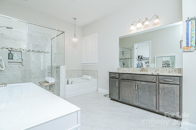 424 Cassia Ct, Fort Mill, SC 29708 - full bath featuring a stall shower, a garden tub, vanity, and a walk in closet