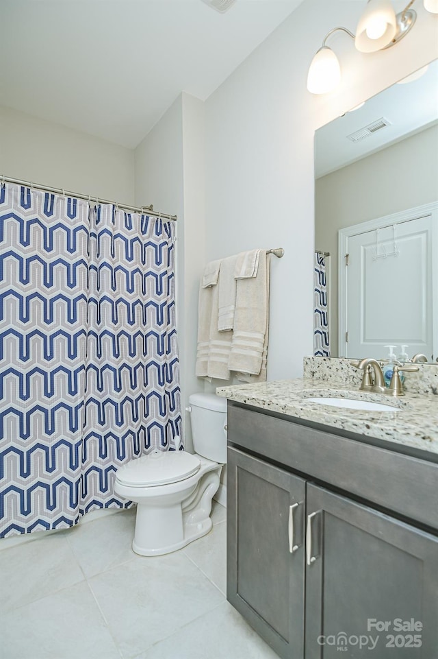 424 Cassia Ct, Fort Mill, SC 29708 - bathroom with tile patterned floors, toilet, vanity, and a shower with shower curtain