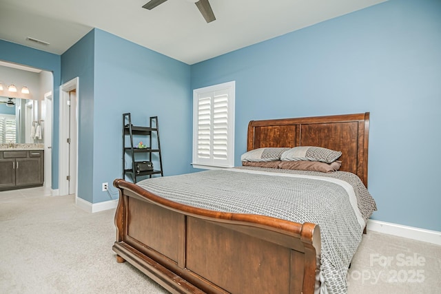 424 Cassia Ct, Fort Mill, SC 29708 - bedroom featuring light colored carpet, baseboards, ceiling fan, connected bathroom, and a sink