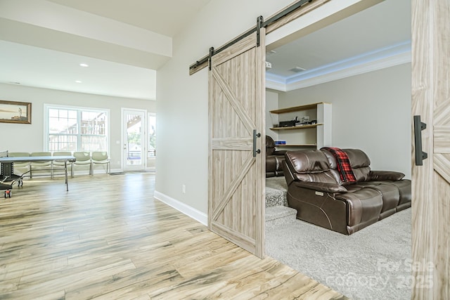 424 Cassia Ct, Fort Mill, SC 29708 - sitting room featuring a barn door, wood finished floors, baseboards, and recessed lighting