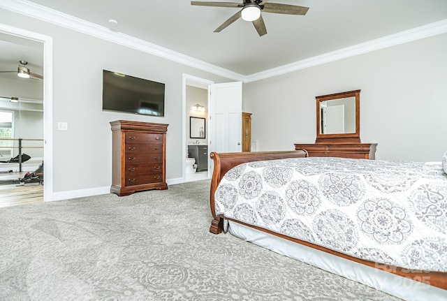 424 Cassia Ct, Fort Mill, SC 29708 - carpeted bedroom featuring crown molding, baseboards, ensuite bathroom, a ceiling fan, and a walk in closet