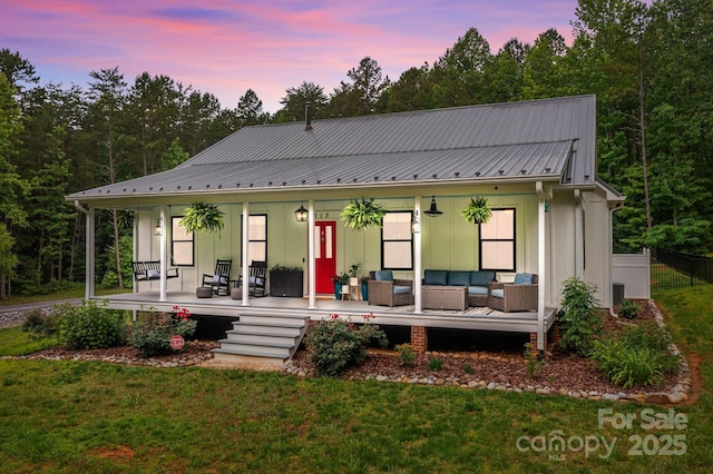 213 Genesis Pl, Cleveland, NC 27013 - view of front of property with an outdoor living space, a porch, metal roof, and board and batten siding