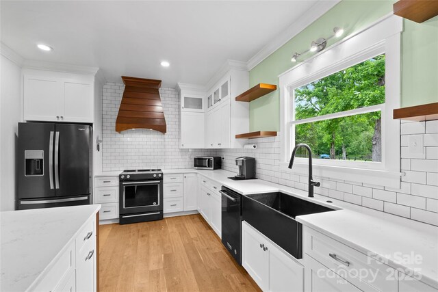 94 Jamestown Ln, Columbus, NC 28722 - kitchen with fridge with ice dispenser, stove, open shelves, a sink, and custom range hood