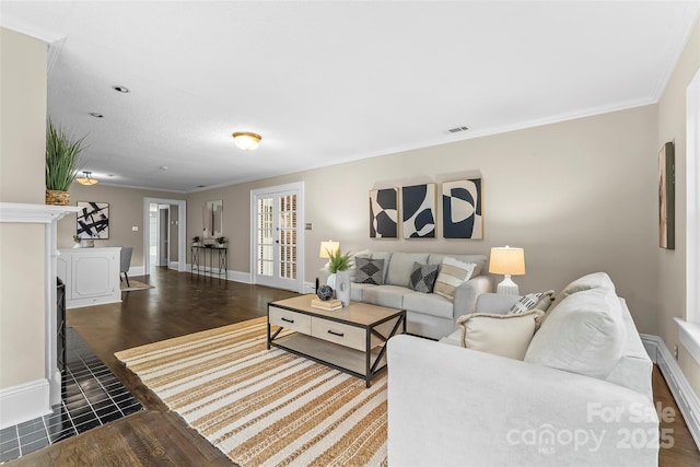 121 33rd Ave NE, Hickory, NC 28601 - living area featuring baseboards, wood finished floors, and ornamental molding
