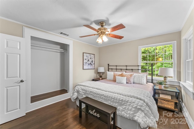 121 33rd Ave NE, Hickory, NC 28601 - bedroom featuring dark wood-style flooring, a closet, baseboards, ornamental molding, and a ceiling fan