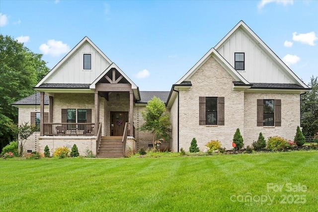 867 Bellegray Rd, Clover, SC 29710 - view of front of home with board and batten siding, brick siding, and a front yard